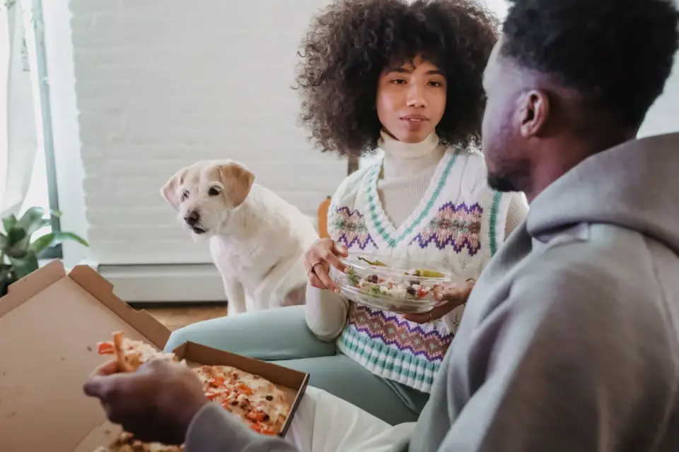 Dog eating from bowl at home