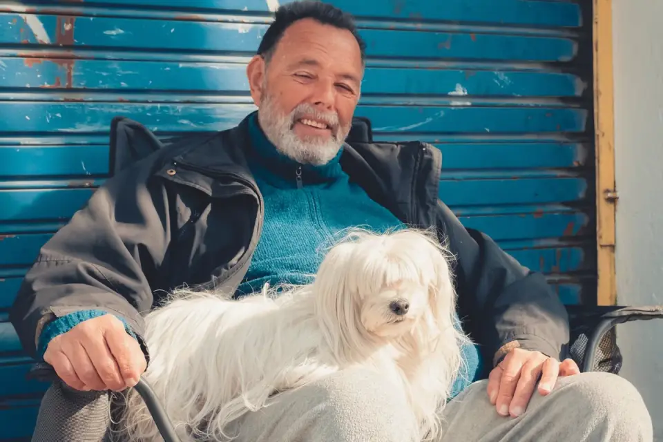 Dog owner at home