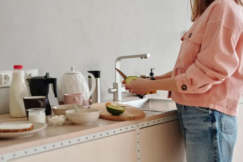 Dog owner preparing a meal