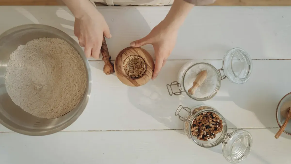 Dog owner preparing dog food kitchen