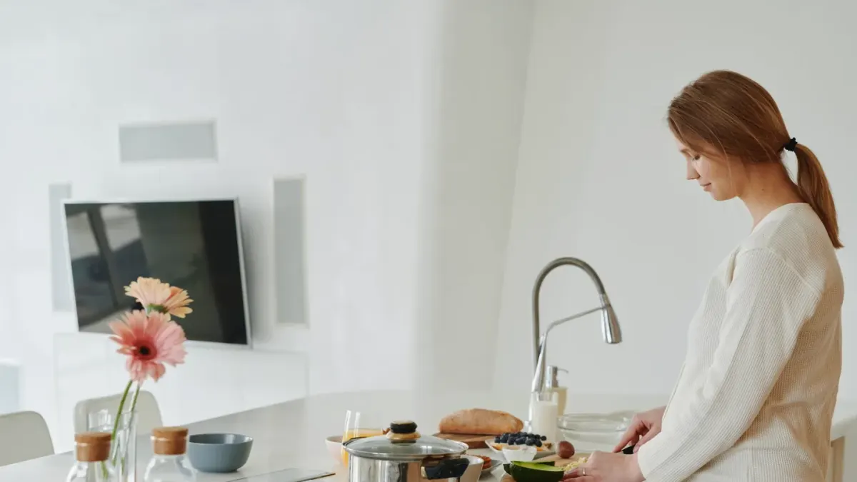 Dog owner preparing dog food kitchen