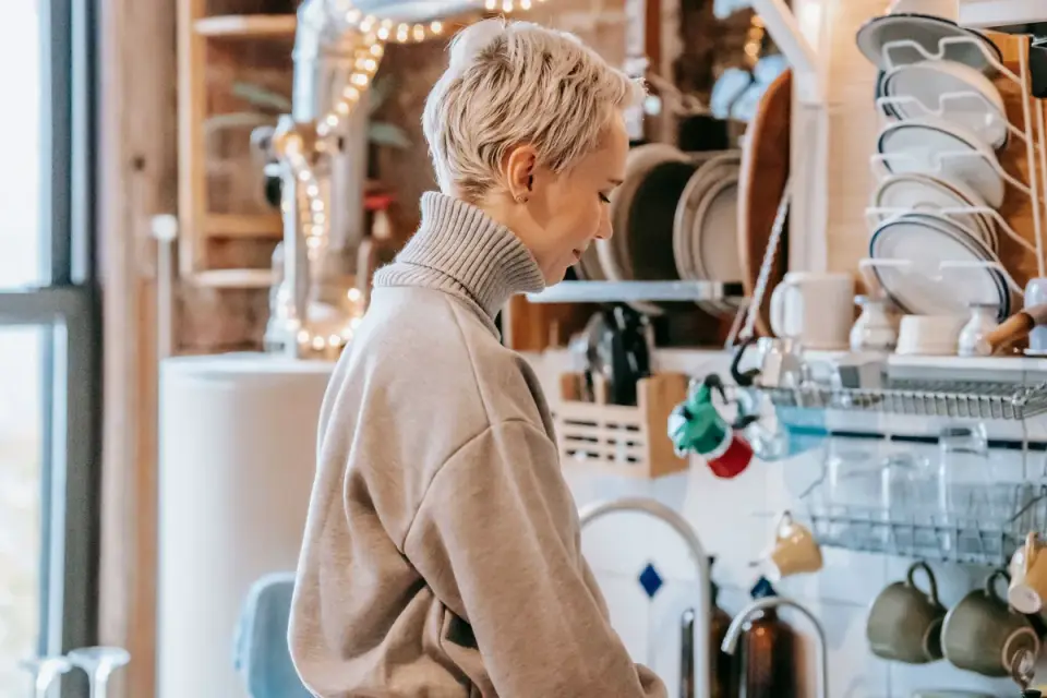 Dog owner preparing dog food kitchen