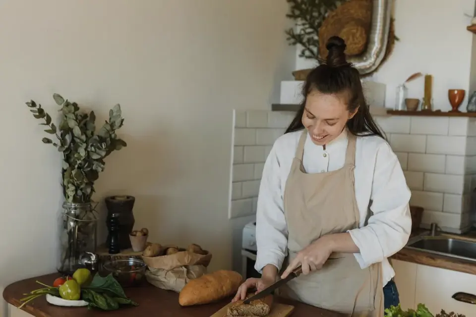 Dog owner preparing dog food kitchen